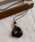 Handmade Brown Leather Patchwork Wooden Hollow Out Pendant Necklace